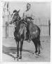 Photograph: [Charley Bishop on horseback]