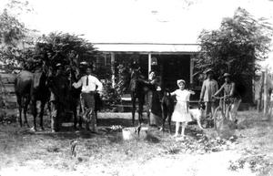 [Tenant farm with bicycles and horses]