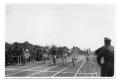 Photograph: [Runners approaching the finish line]
