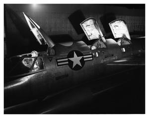 Primary view of object titled 'Night Shot of Crew Members in B-58'.
