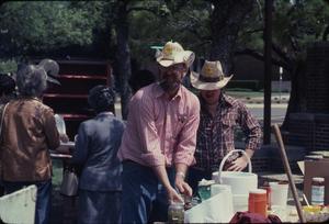 Primary view of Photograph of B. W. Aston Preparing Food at Western Heritage Day