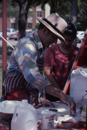 [Photograph of Lawrence Clayton Chuck Wagon Cooking]
