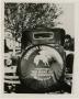 Thumbnail image of item number 1 in: '[Photograph of Simmons College Tire Cover]'.