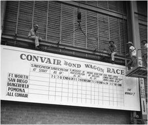 Primary view of object titled 'Workers erect "Bond Drive" sign'.