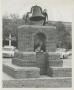 Photograph: [Photograph of Student Studying on Bell Tower]