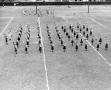 Photograph: [Photograph of Cowgirls on Football Field]