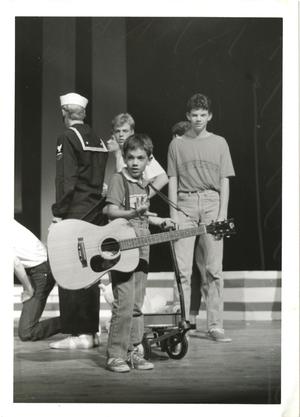 [Photograph of Little Elvis at All School Sing]