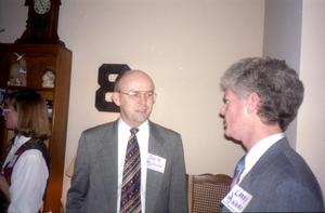 Primary view of object titled '[Photograph of David Smith and Larry Ware at Alumni Meeting]'.