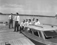Photograph: [Group of Men on Boat at Dock]