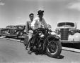 Thumbnail image of item number 1 in: '[Two Men Riding a Motorcycle]'.