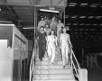Photograph: [Group of Women Walking Down a Staircase]