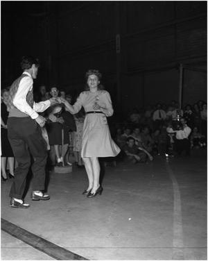 Couple doing the Jitterbug at Lockheed Martin performance by Frankie Masters' Orchestra