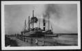 Photograph: [Ships probably near a wharf. Location unknown.]
