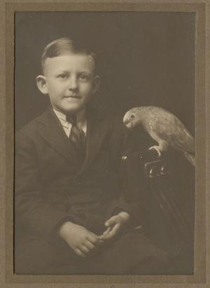 Primary view of object titled '[Photograph of John M. Sharpe, Jr. with a Parrot]'.