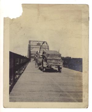 Primary view of object titled '[Pierce-Arrow automobile on bridge]'.