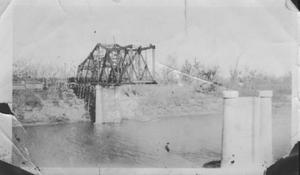 [Construction of the Brazos River Bridge. Bridge is halfway across the river.]
