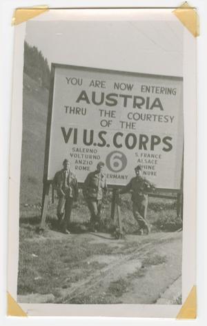 [Three Soldiers Standing by a Sign for Austria]