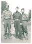 Photograph: [Three Members of the 12th Armored Division's Combat Command A]