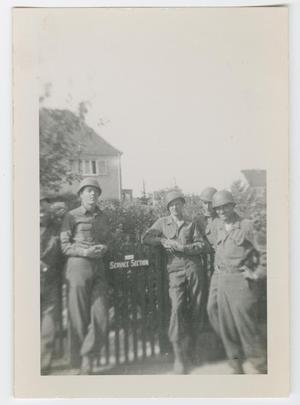 [Five Soldiers in Front of a Fence]