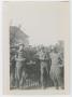 Photograph: [Five Soldiers in Front of a Fence]