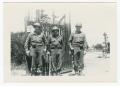 Primary view of [Three Soldiers Standing by a Gate]