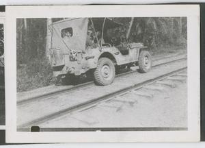 [Jeep on Railroad Track]