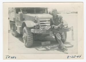 [William Giannopoulos Leaning on a Half-Track]