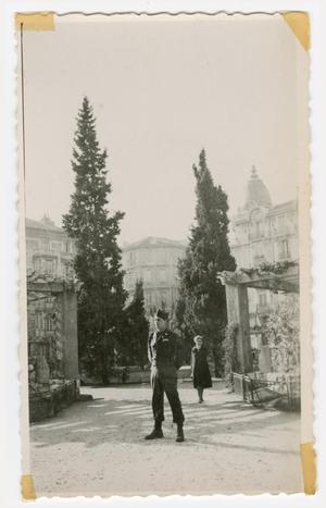 [Soldier Standing in Front of Garden in Nice, France]