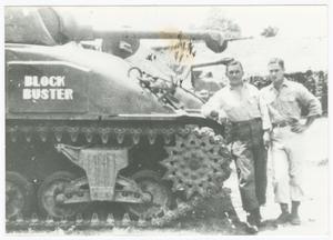 Primary view of object titled '[Two Men Standing by a Tank Named "Block Buster"]'.