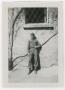 Photograph: [Soldier Standing Under a Window]