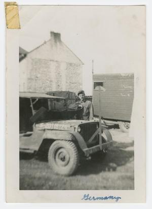 [Soldier Beside a Jeep]