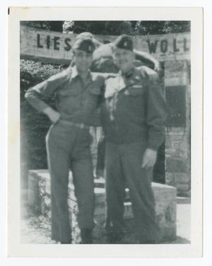 [Two Soldiers in Front of Statue]