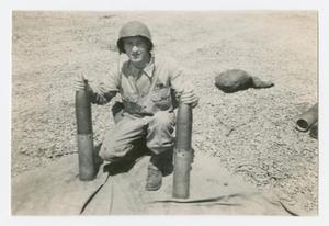 Primary view of object titled '[Soldier with Artillery Shells]'.