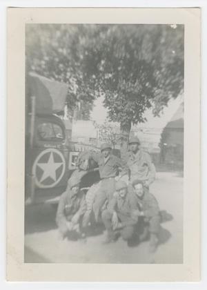 [Five Soldiers Beside an Army Truck]