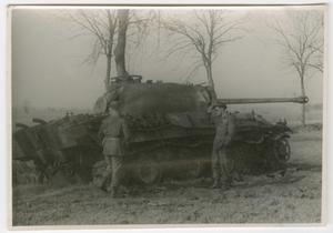 [Two Soldiers by a Wrecked German Tank]