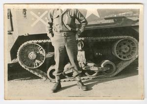 [William Hahn Standing Before a Half-Track]
