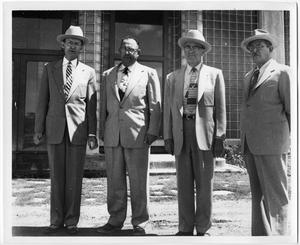 Four Men in Suits