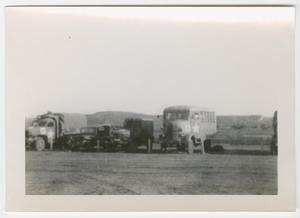 [U.S. Army Vehicles Parked in a Line]