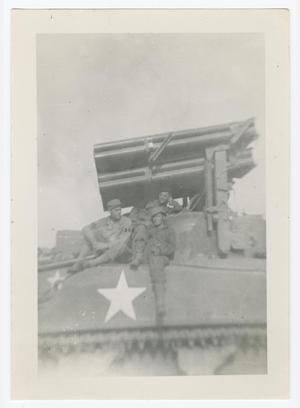 Primary view of object titled '[Soldiers Sitting Beside a T-34 Calliope Rocket Launcher]'.