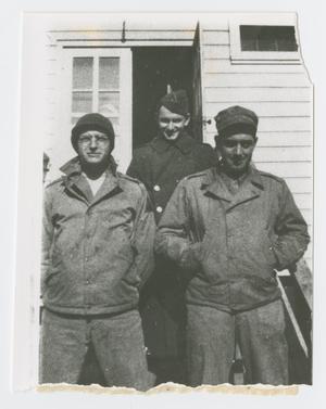 [Three Soldiers Standing in Front of Camp Campbell Dayroom]