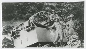 [Soldiers by Overturned Tank]