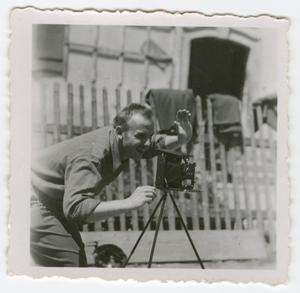 Primary view of object titled '[Carl Zutz with a Camera]'.