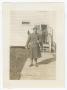 Thumbnail image of item number 1 in: '[Edward Scott Standing in Front of a Barracks Building]'.