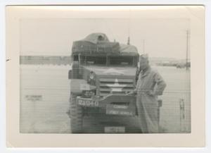 [Rufus Baxter in Front of a Half-Track]