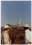 Photograph: Two Cowboys Looking at Feedyard
