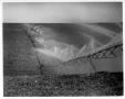 Photograph: [Irrigated field and industrial sprinklers]