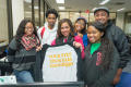 Photograph: [Students pose with NABJ shirt]