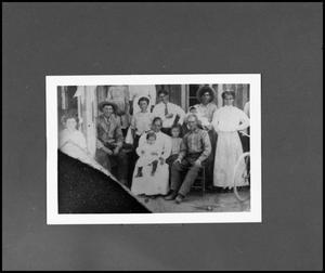 Primary view of object titled '[Lerma Family at the Home of Robert Lyles and Herculana Rivera]'.