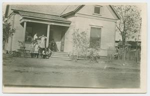 Primary view of object titled '[Family on a House's Porch]'.
