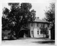 Photograph: Large Ranch House and Model-T Car